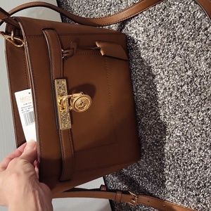 Michael Kors leather purse. Approximately 8 x 10.